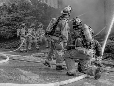 Fire departments respond to out of control house fire